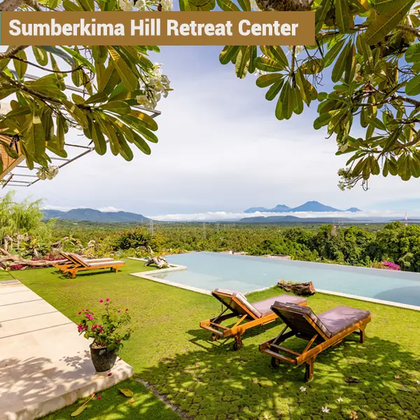 nfinity pool with panoramic views of mountains and ocean at Sumberkima Hill retreat center in Northwest Bali